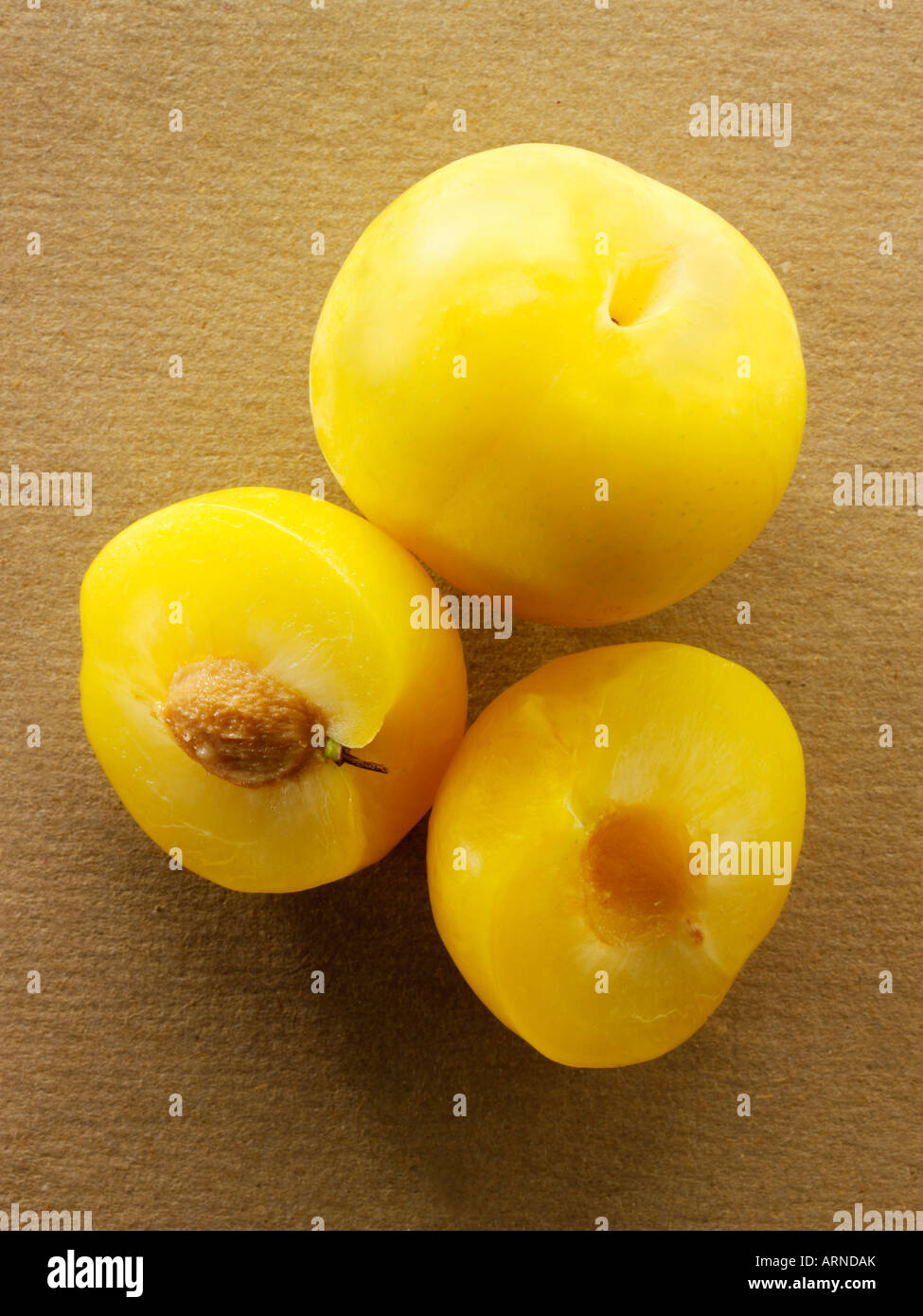 Yellow Plum - cut and whole Stock Photo