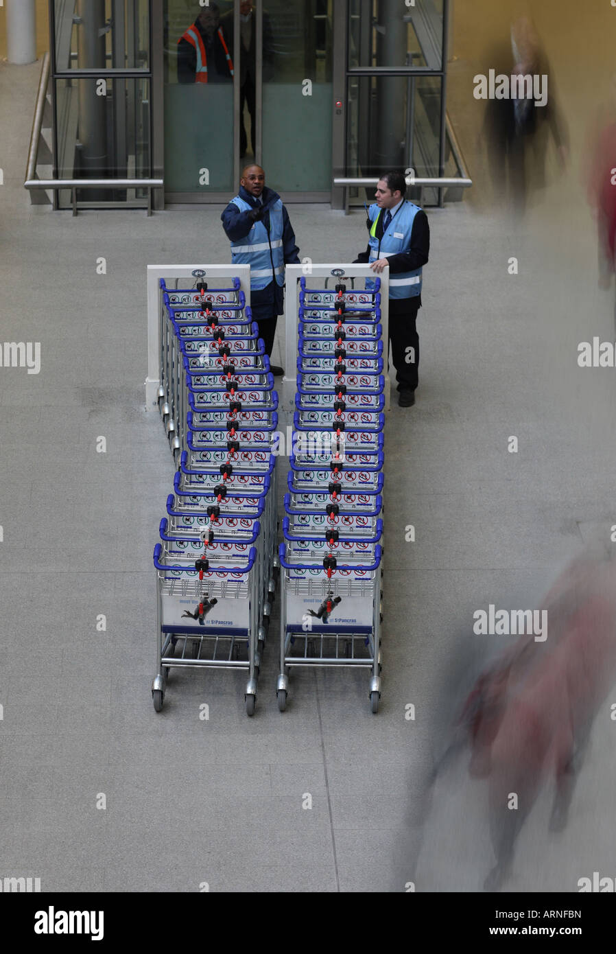 St. Pancras railway station. luggage carriers Stock Photo Alamy