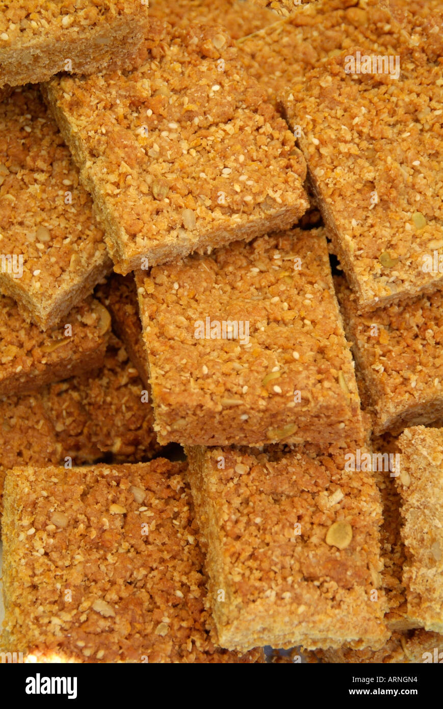 flap jack Biscuit flat rectangle rectangular 4 four eat sweet food desert confection crisp crunch thick Stock Photo