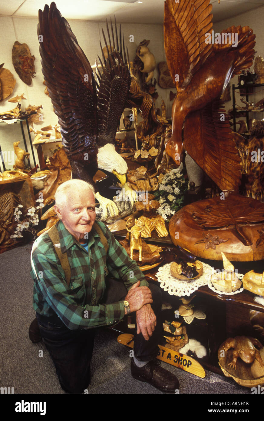 Qualicum Beach Local artisan, woodcarver Paul Bourbeau in his studio, Vancouver Island, British Columbia, Canada. Stock Photo