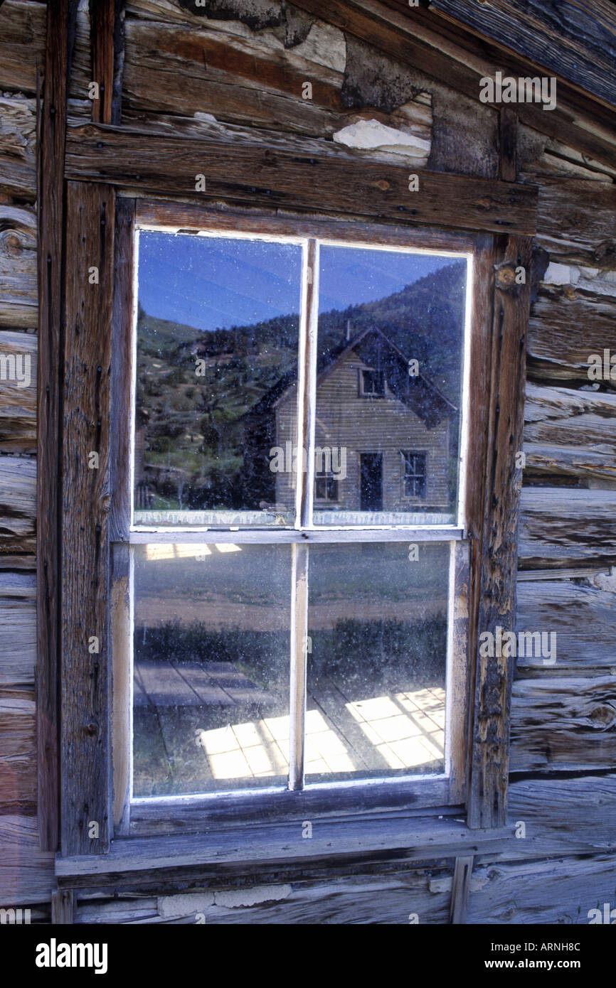 Dillon Montana Log Cabin With Reflection Of Another Log Cabin In