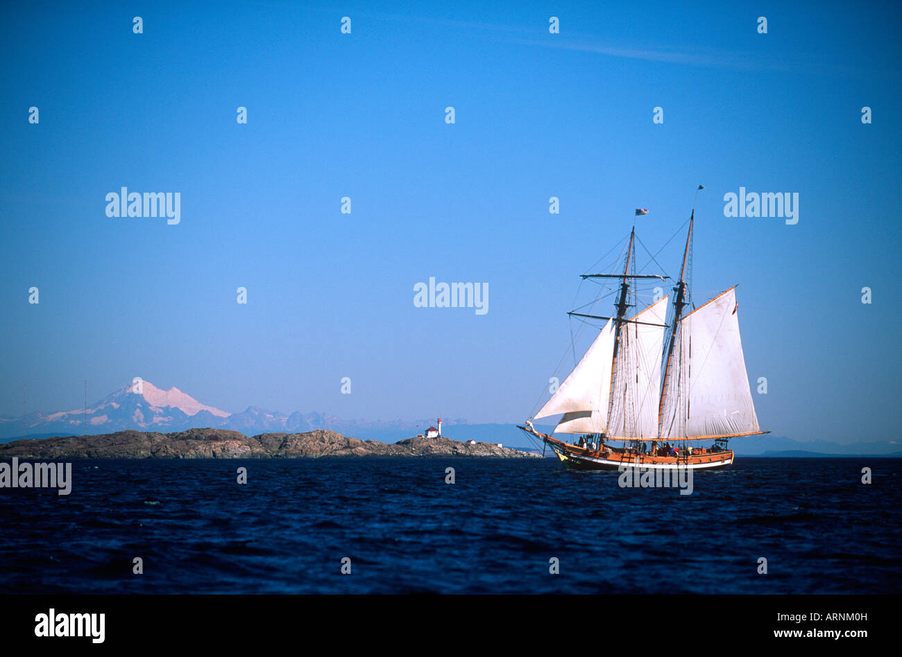 gaff rigged sailboat off Discovery Island,Victoria waterfront, Vancouver Island, British Columbia, Canada. Stock Photo