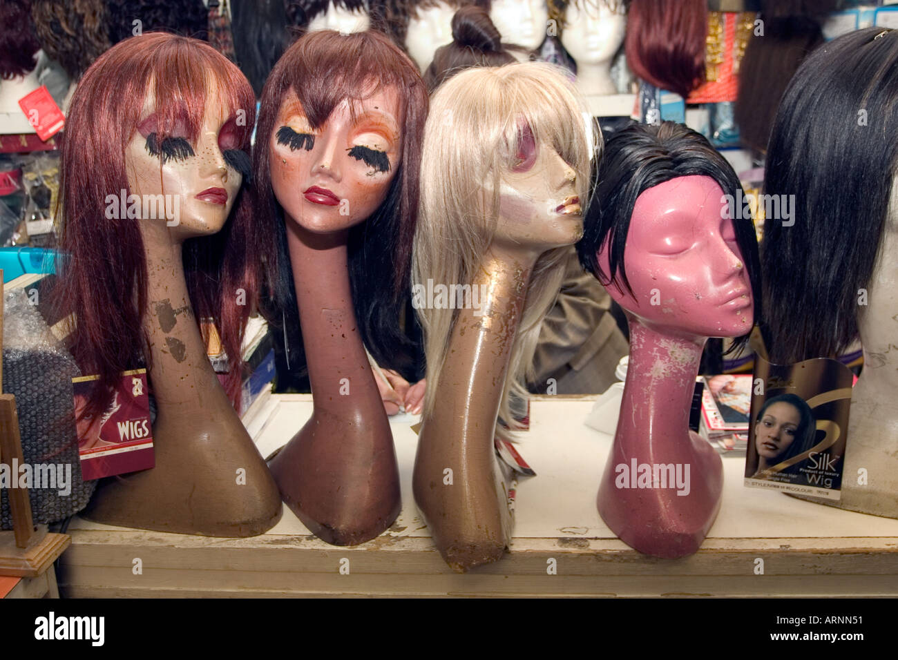 Wigs for Sale - Retro mannequins, London, UK Stock Photo