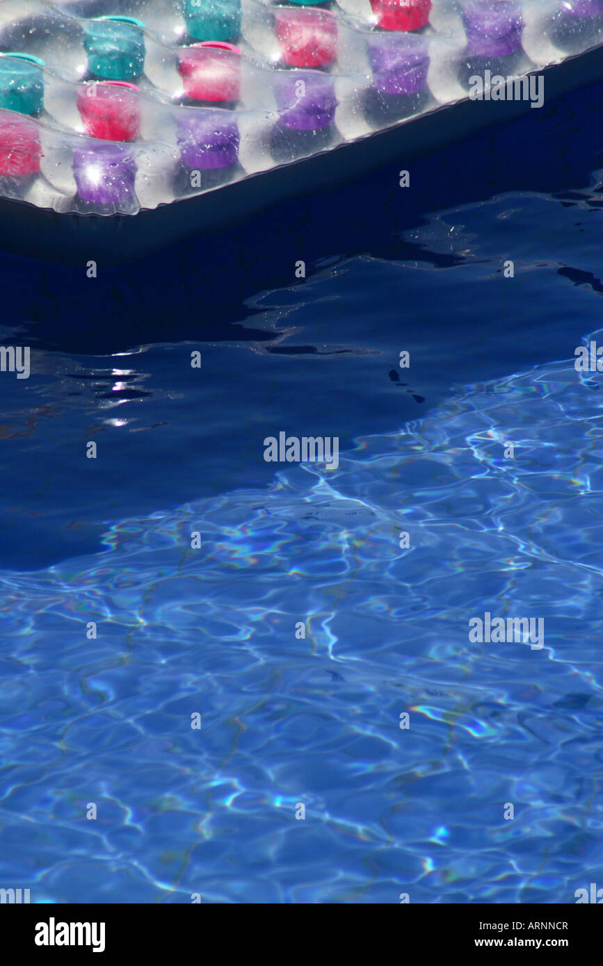 Abstract inflatbale bed floating on a swimming pool Stock Photo Alamy