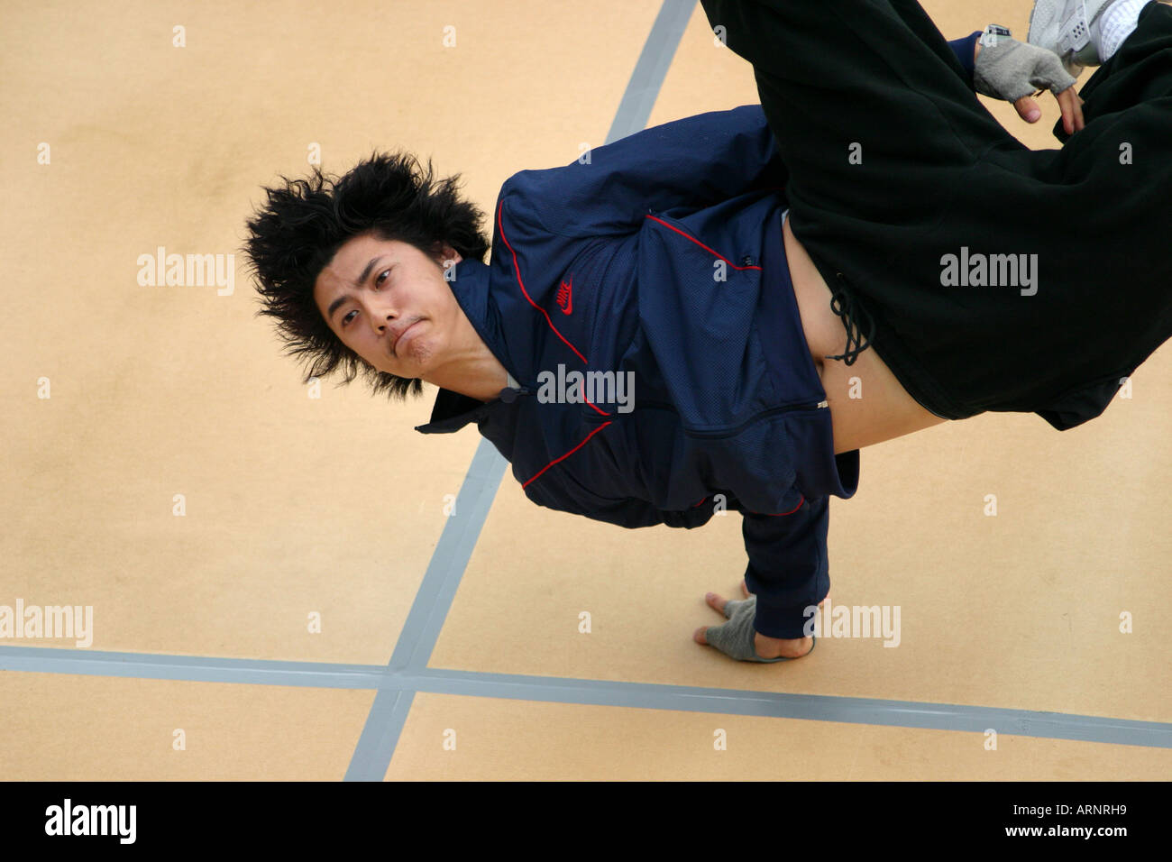 a breakdancer holding a move Stock Photo