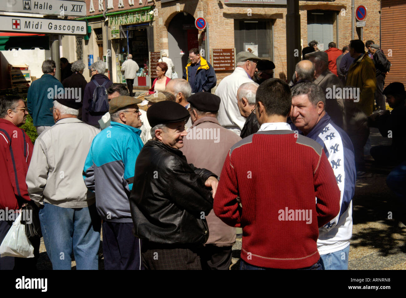 France Southwest Gascony Typical farmer old boys meeting in market of Beaumont de Lomagne on a Saturday morning market day Stock Photo