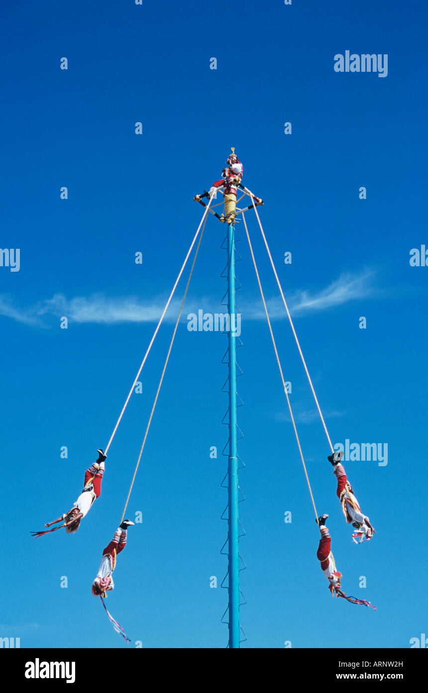 Mexico, Voladores (flyers), perform Totonac Native ritual,  outside of Tulum, Yucatan Stock Photo