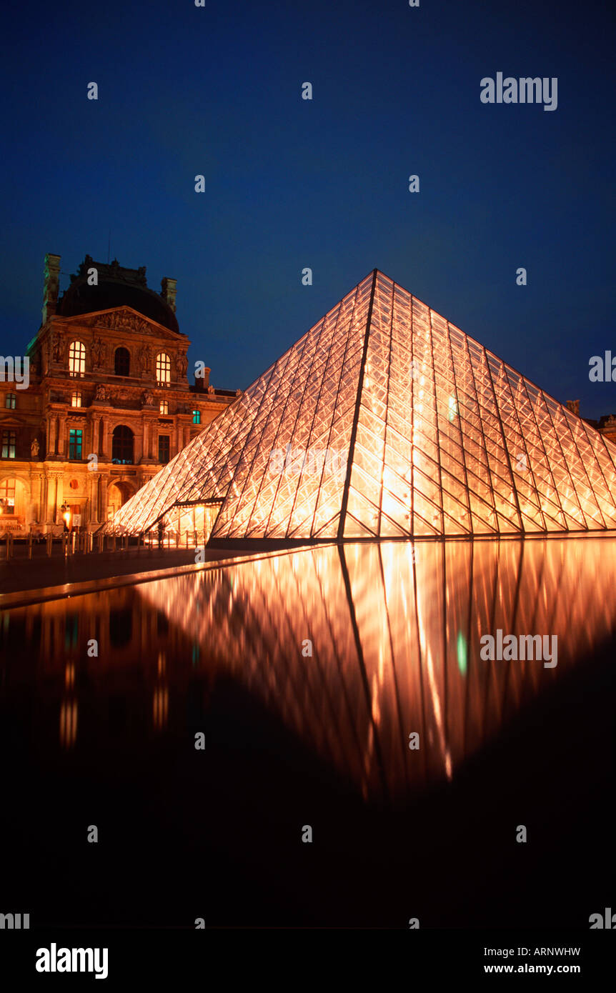 France, Paris, The Louvre, pyramid by EM Pei and Richeleau wing Stock Photo