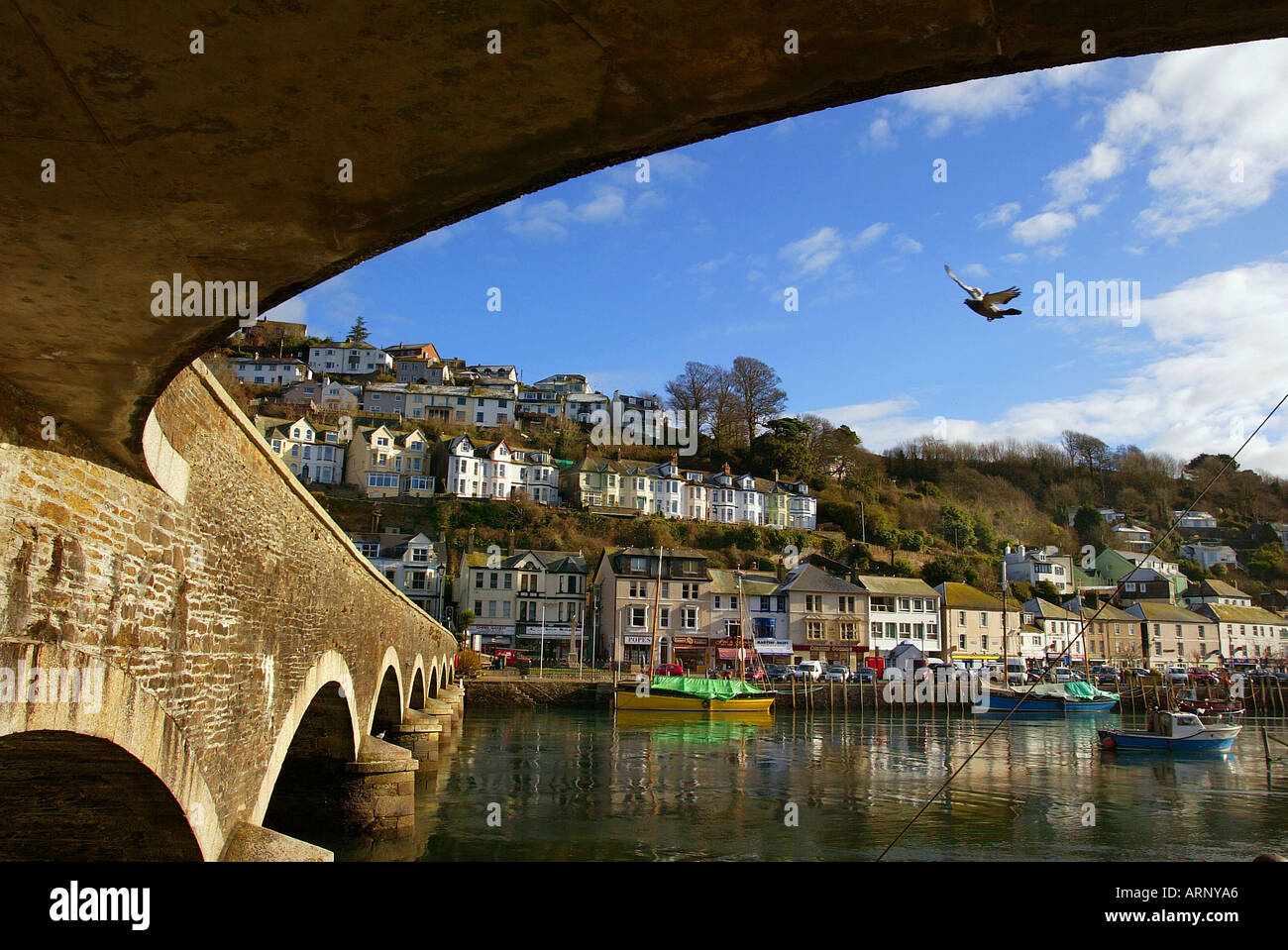 Under the arch at Looe in Cornwall UK Stock Photo