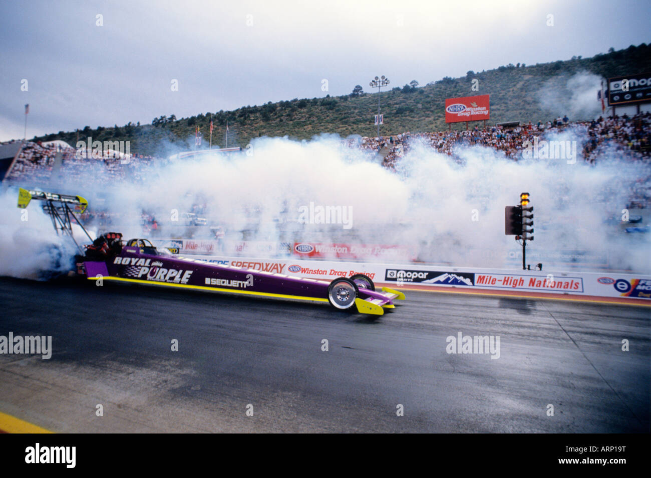 Kristen Powell competes in her drag racer at the 1997 Mopar Nationals Stock Photo