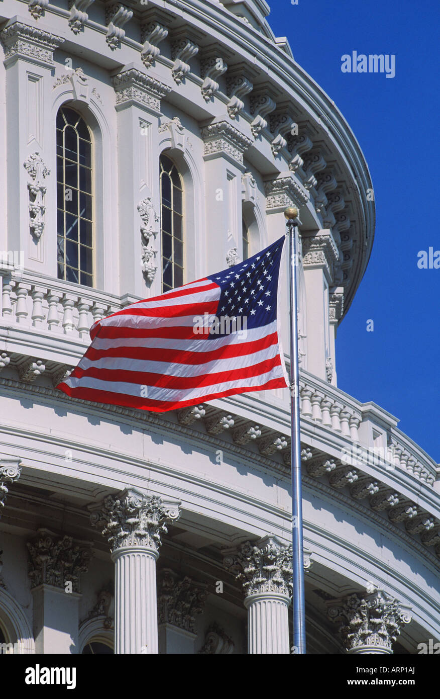 USA, Washington, DC, capitol building with US Flag Stock Photo