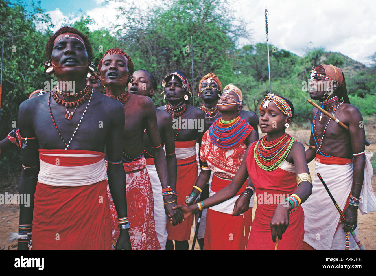 Samburu moran or warriors and girls dancing in traditional dress Samburu National Reserve Kenya East Africa Stock Photo