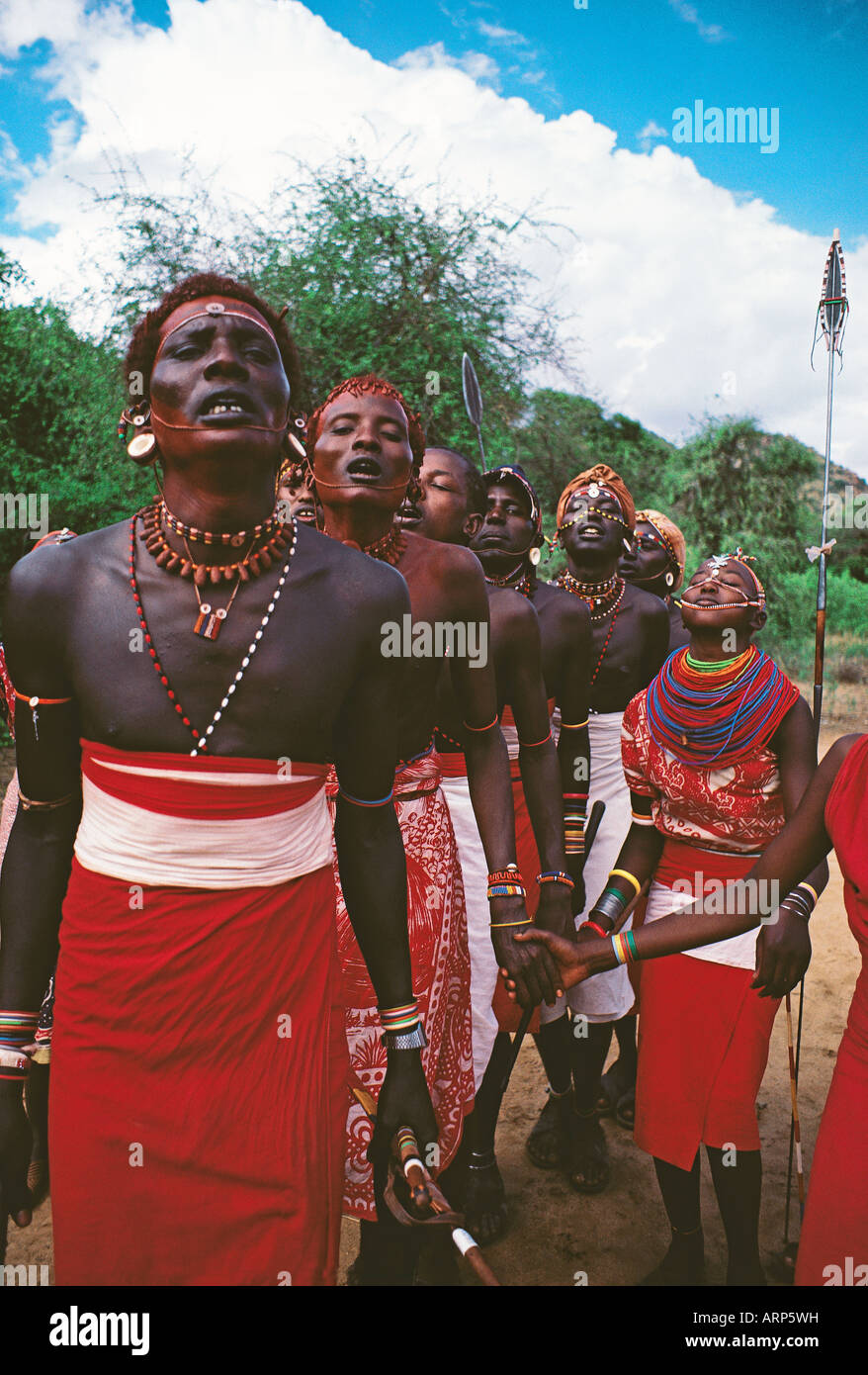 Samburu moran or warriors and girls dancing in traditional dress Samburu National Reserve Kenya East Africa Stock Photo