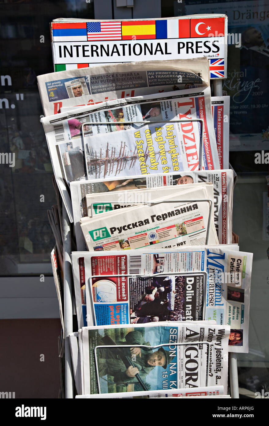 Newspapers on an International Press stand outside newsagent Germany