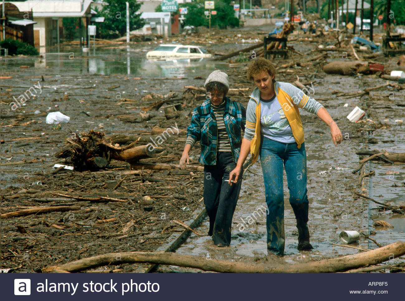 Flood in Clifton Arizona 1983 Residents of Clifton walk down main Stock