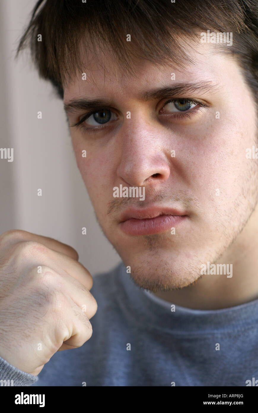 Straight faced man hi-res stock photography and images - Alamy