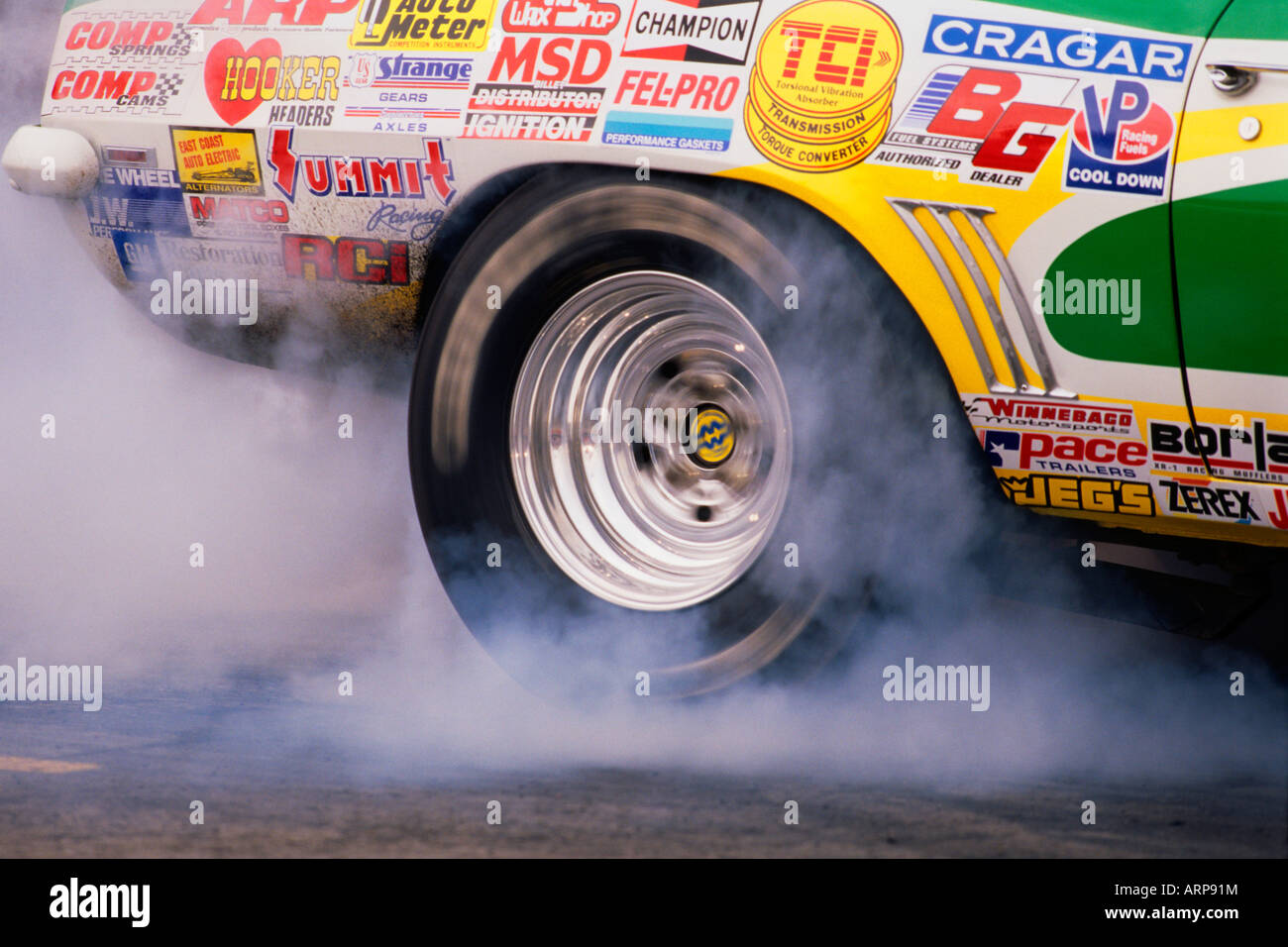 Tire spinning at the start of drag race at the 1997 Mopar Nationals