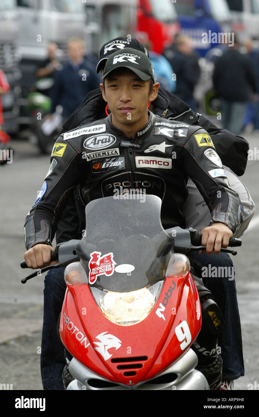 Nobuatsu Aoki, Japanese Moto GP competitor for Proton Team KR, in the paddock before racing Stock Photo