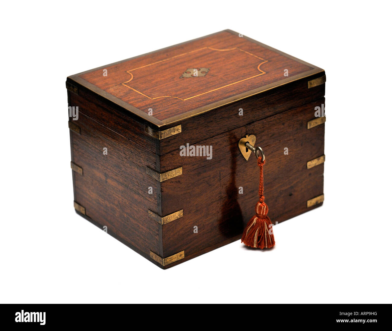 A Wooden Victorian military campaign box in Mahogany and Brass with Key Stock Photo