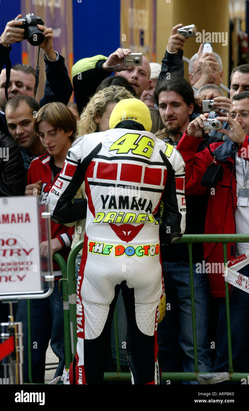 Five time world motorcycle champion, Valentino Rossi, signing autographs at the Valencia Moto Grand Prix Stock Photo
