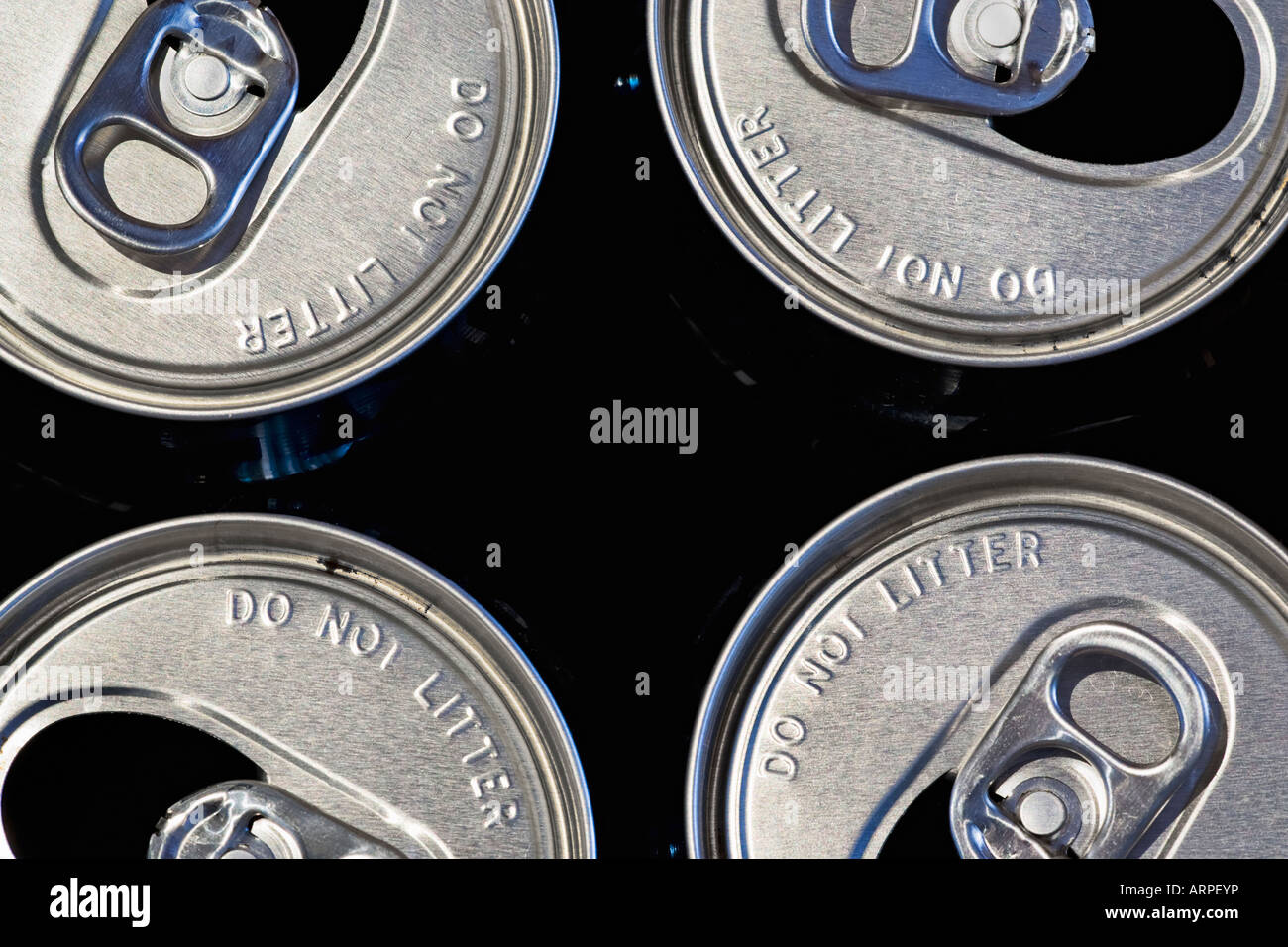 Used aluminium drink cans with 'Do Not Litter' stamped around the rim