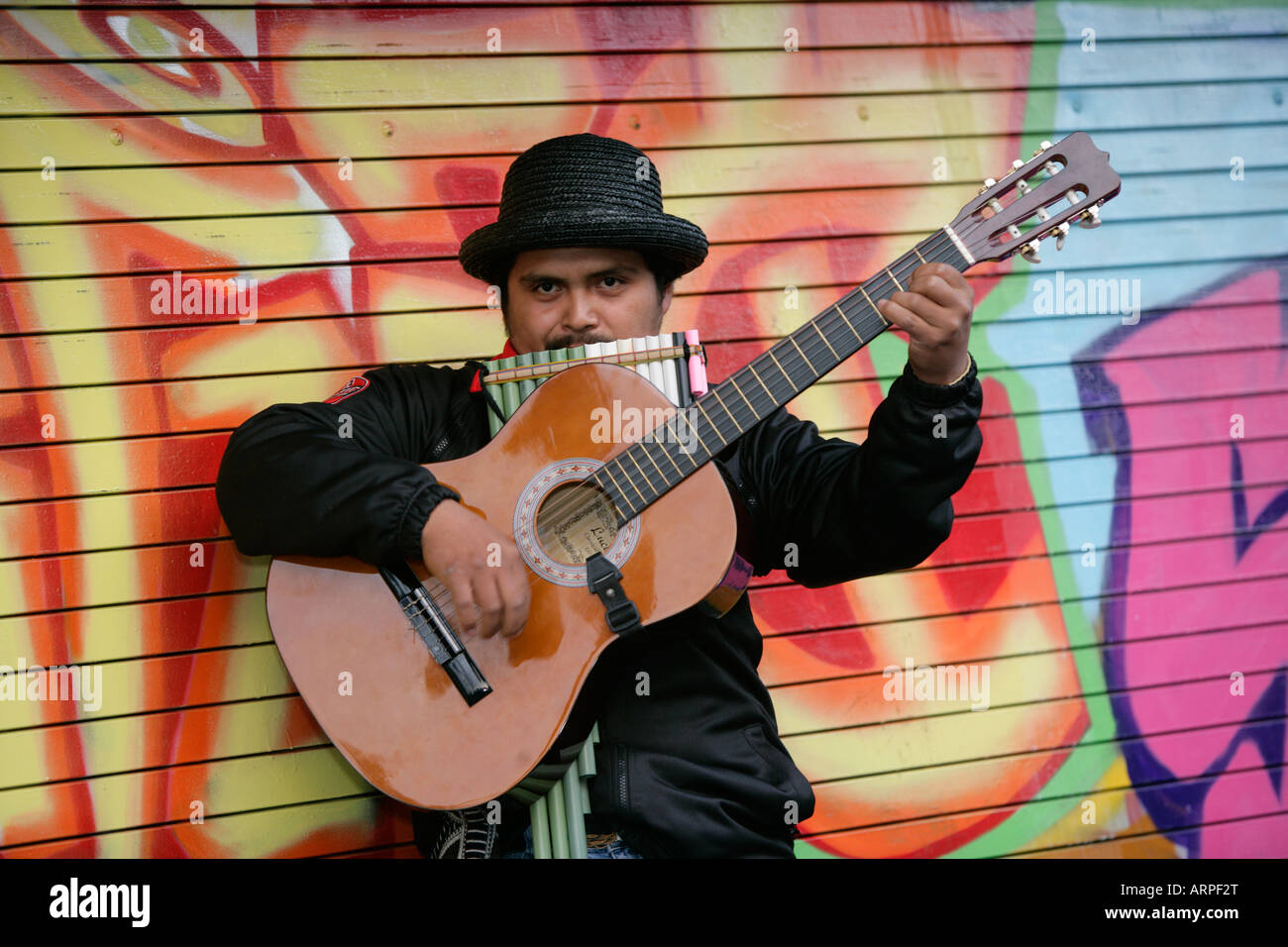 Hispanic musician on Mission St Stock Photo