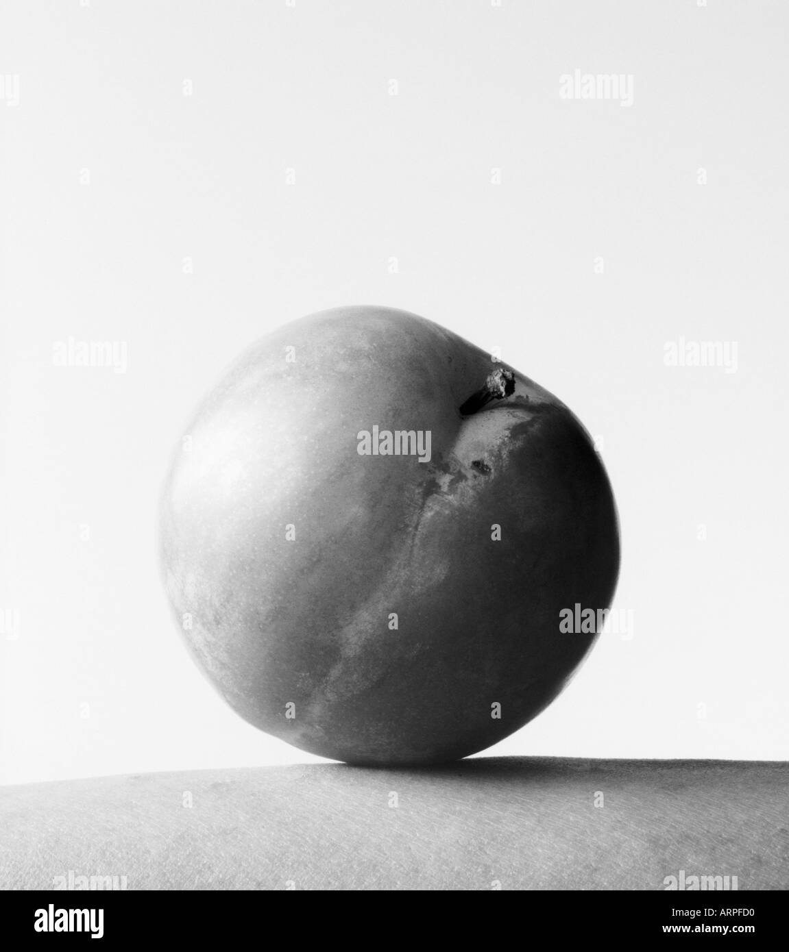 close up black and white image of a nectarine on skin Stock Photo Alamy