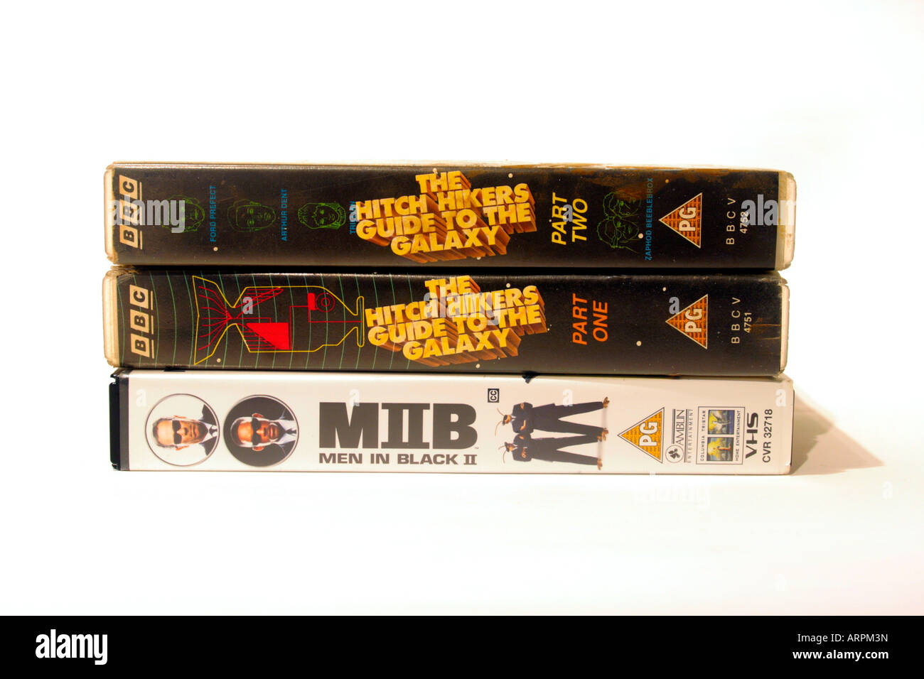 three VHS videos. The Hitchhikers Guide to the Galaxy, written by