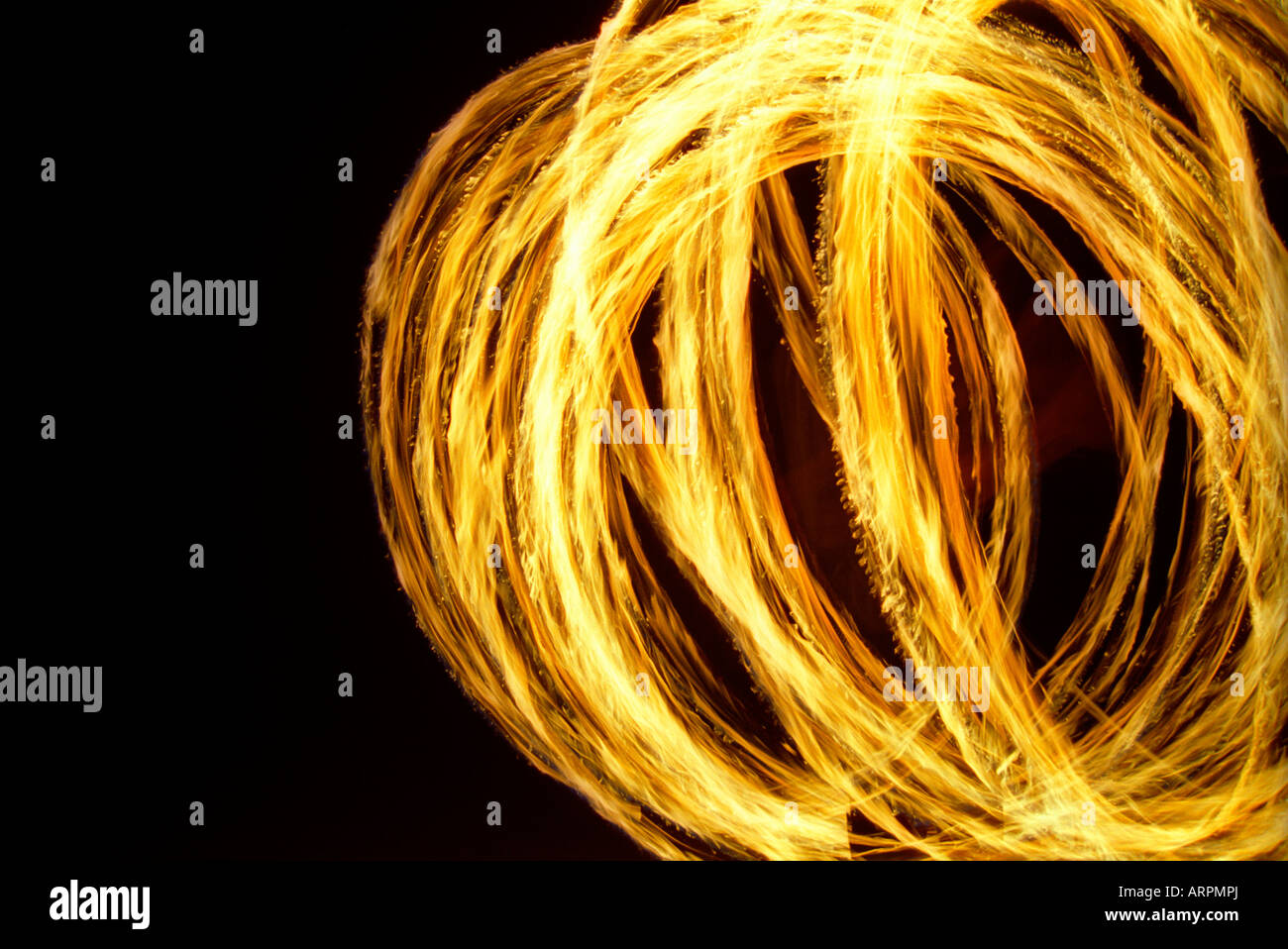 Man swinging fire chains on Pulau Weh beach Sumatra, Indonesia Stock ...
