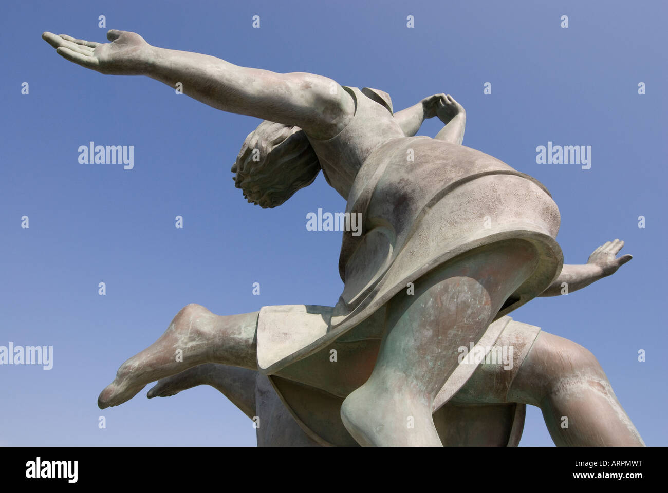 Statue of two females dancing Stock Photo
