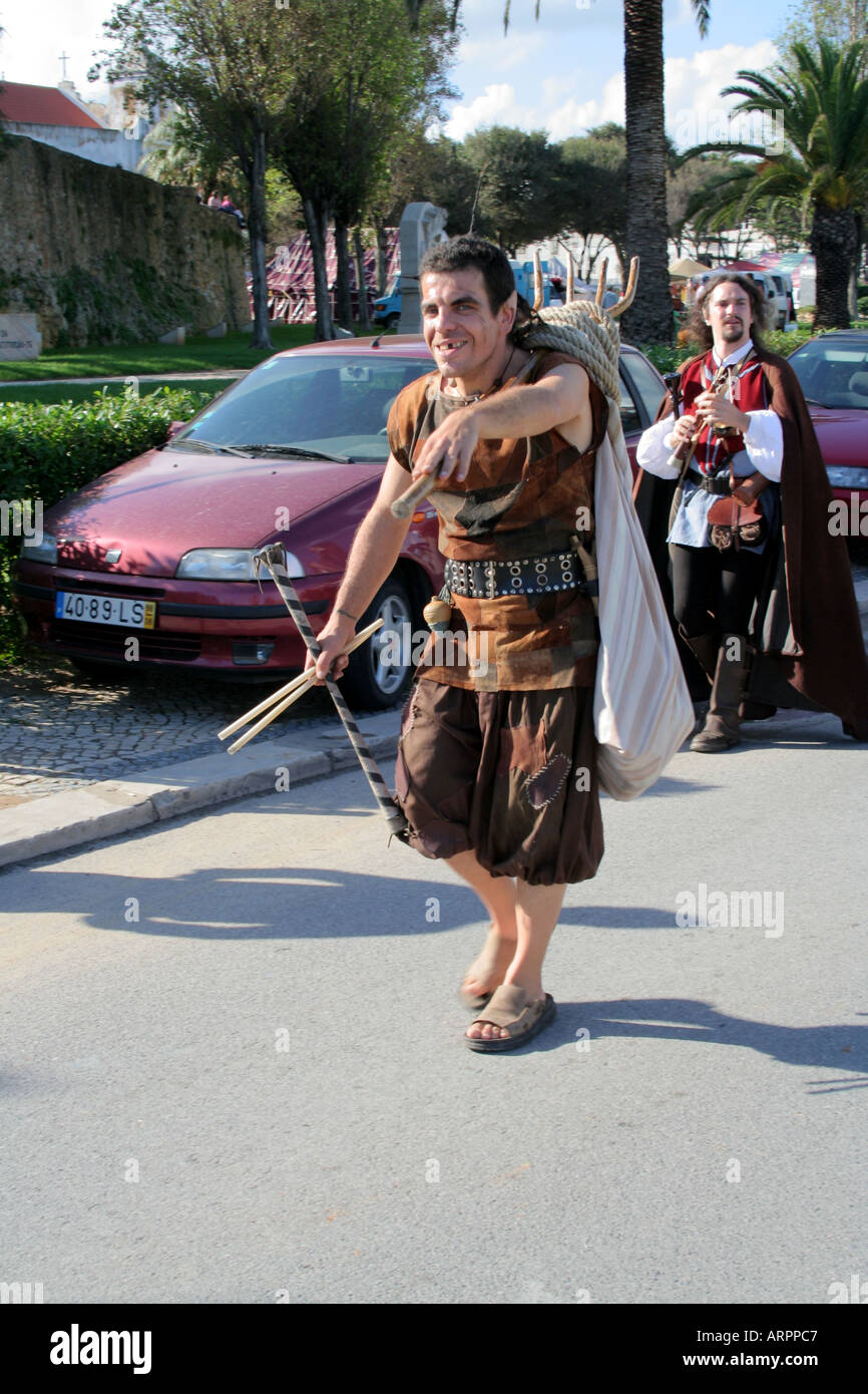 The ugly and bad carrying pitchfork at the Historic Parade Festival dos Descobrimentos Lagos