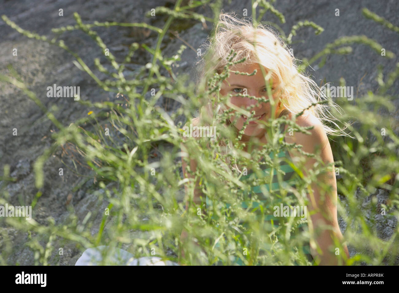 Woman Hiding In The Bushes