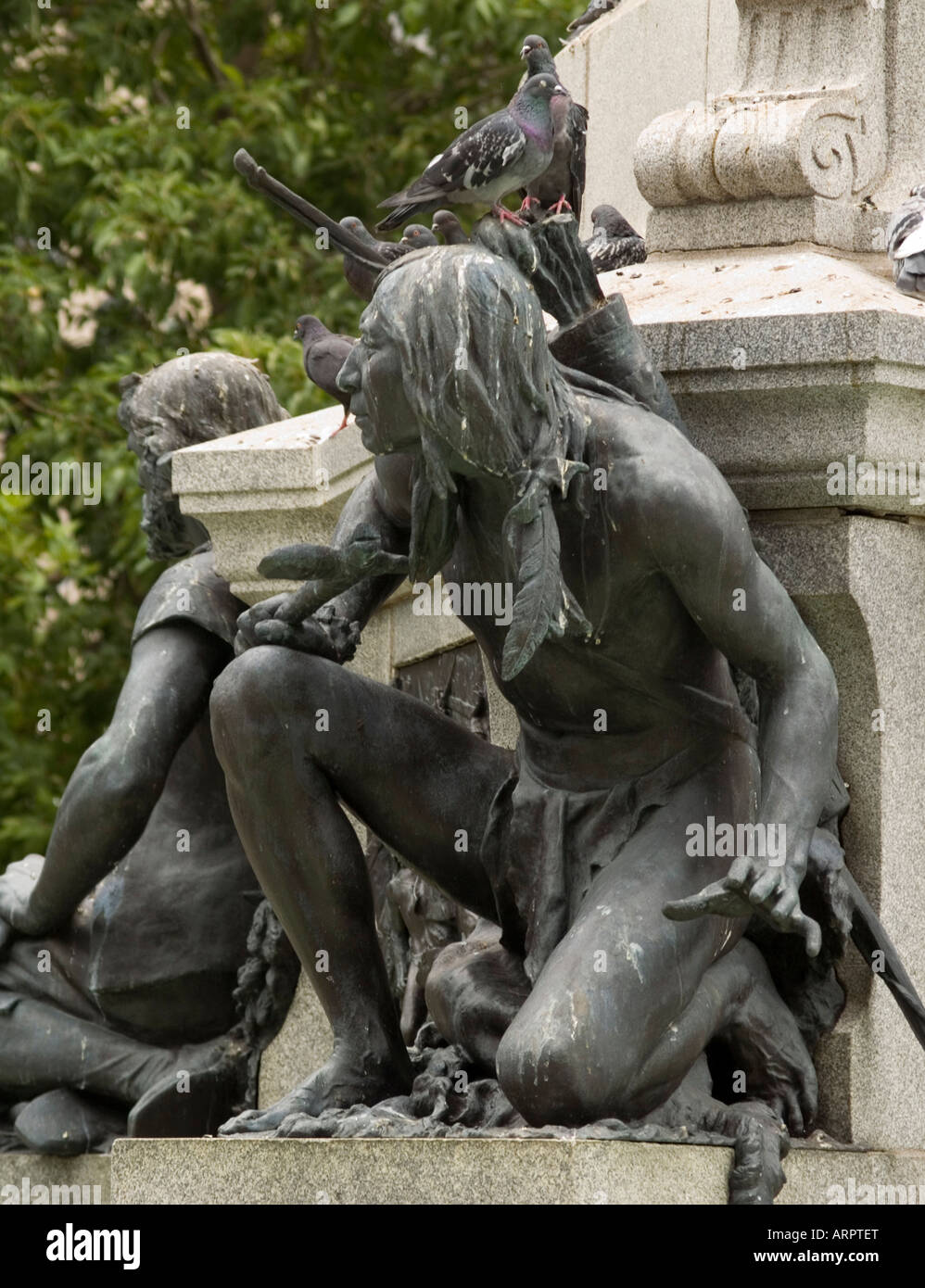 Close up on a statue of an Iriquois Brave as part of a fountain in Place D'Arms, Vieux Montreal Quebec Canada Stock Photo