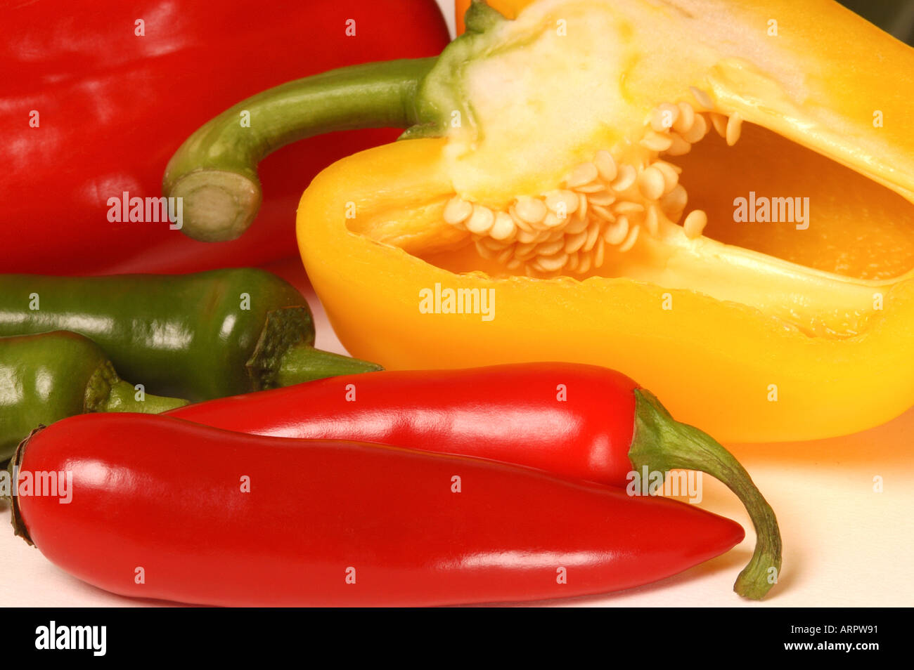 Close up of Yellow and Red Peppers pepper Chillies salad vegetable vegetables Stock Photo