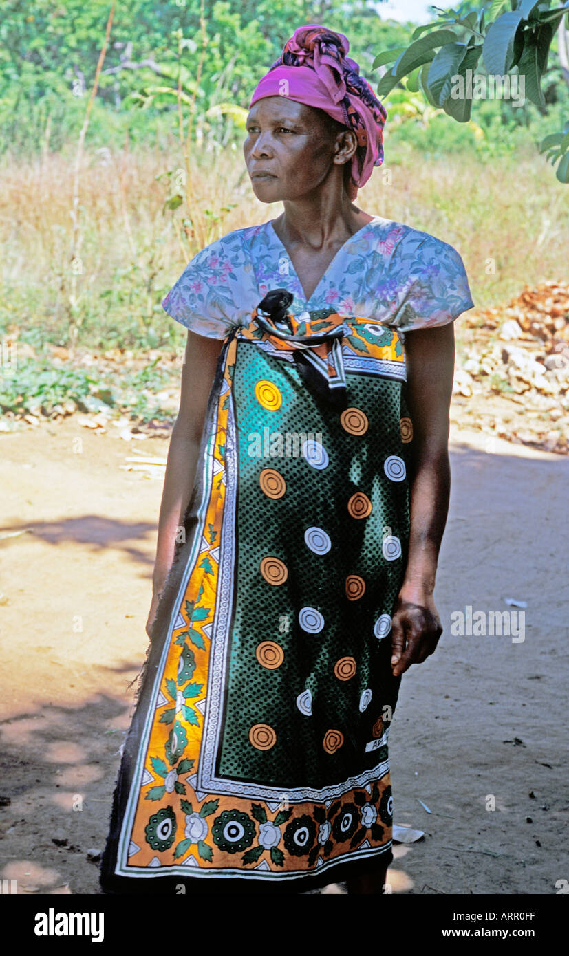 AFRICA KENYA KALIFI Kenyan Women s Dairy Co operative member wearing traditional kanga cloth skirt and headress Stock Photo