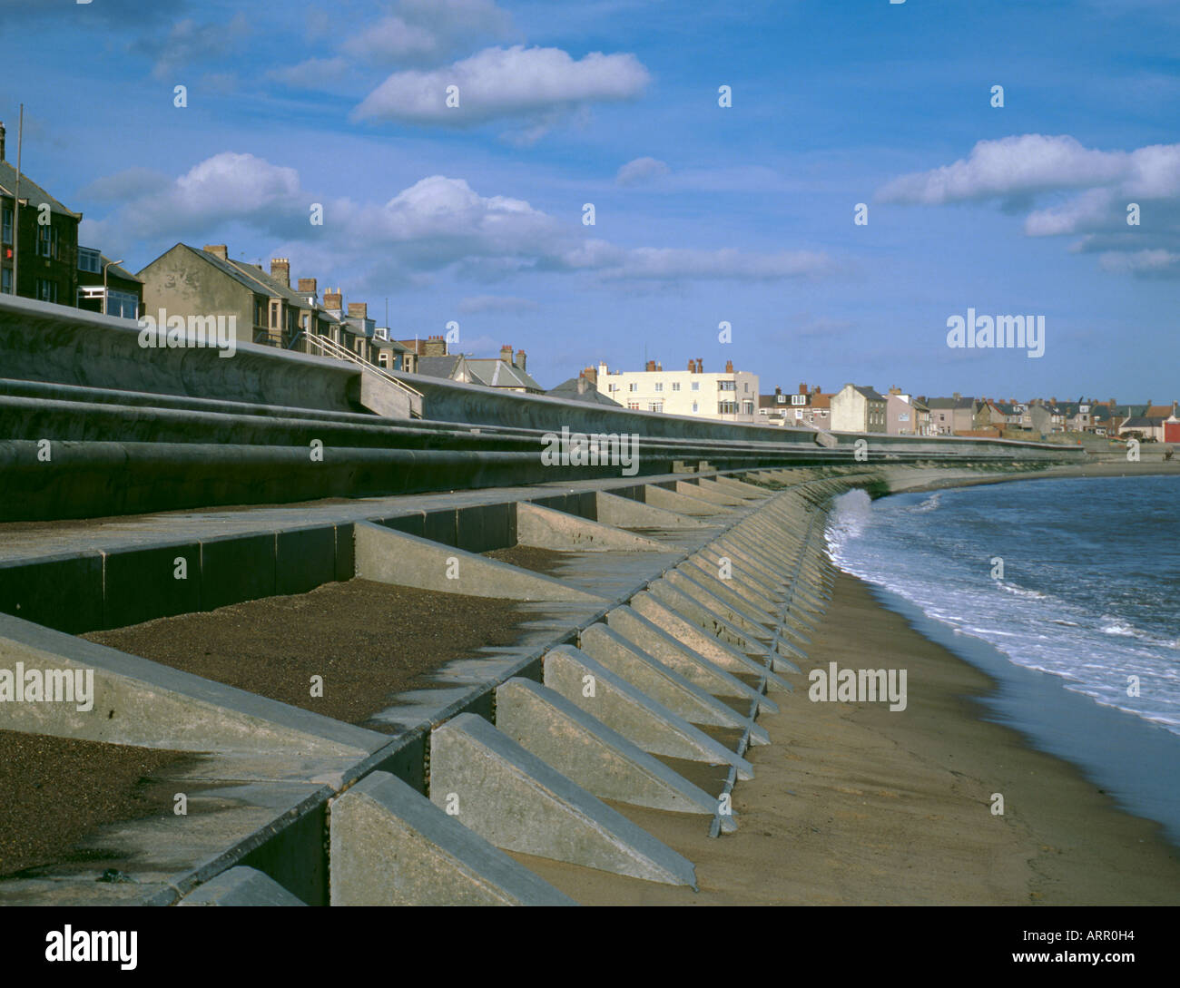 Coastal protection; reinforced concrete stepped berms and wave wall, Newbiggin-by-the-Sea, Northumberland, England, UK. Stock Photo