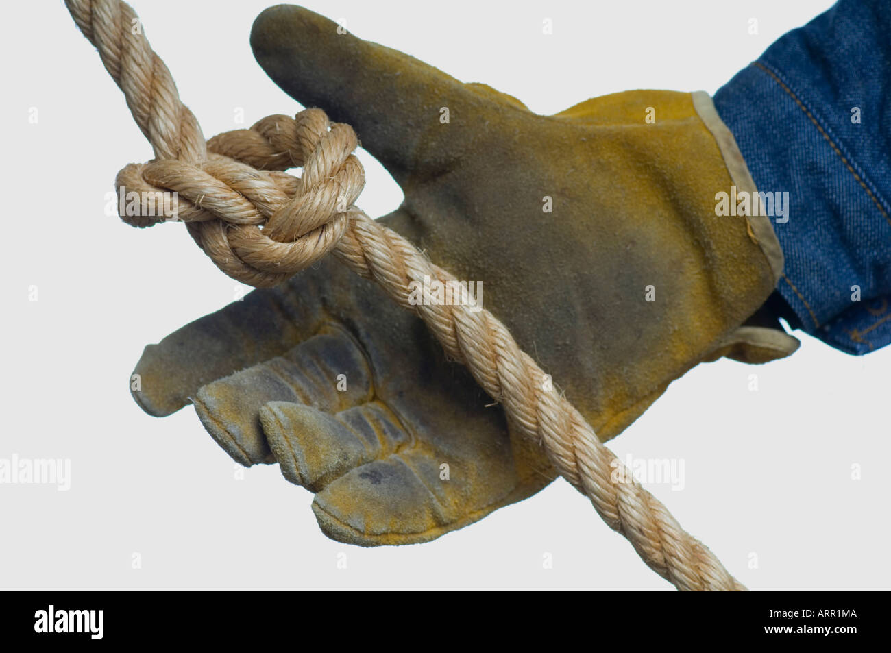 hands leather gloves holding heavy rope Stock Photo Alamy