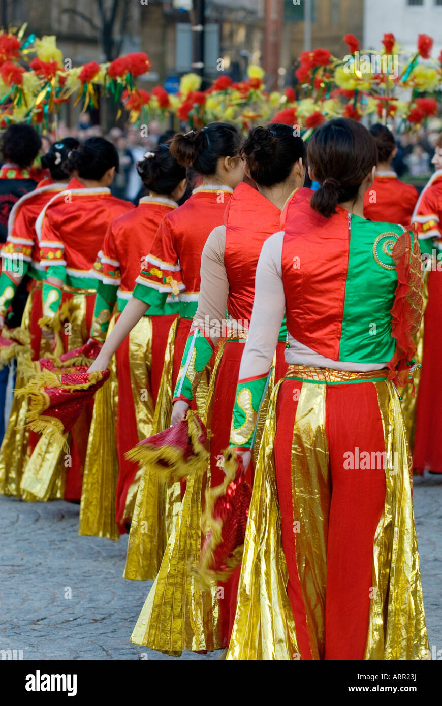 Chinese teenage girls dancers performing in the Chinese new year celebration in Albert Square Manchester city Centre UK Europe Stock Photo