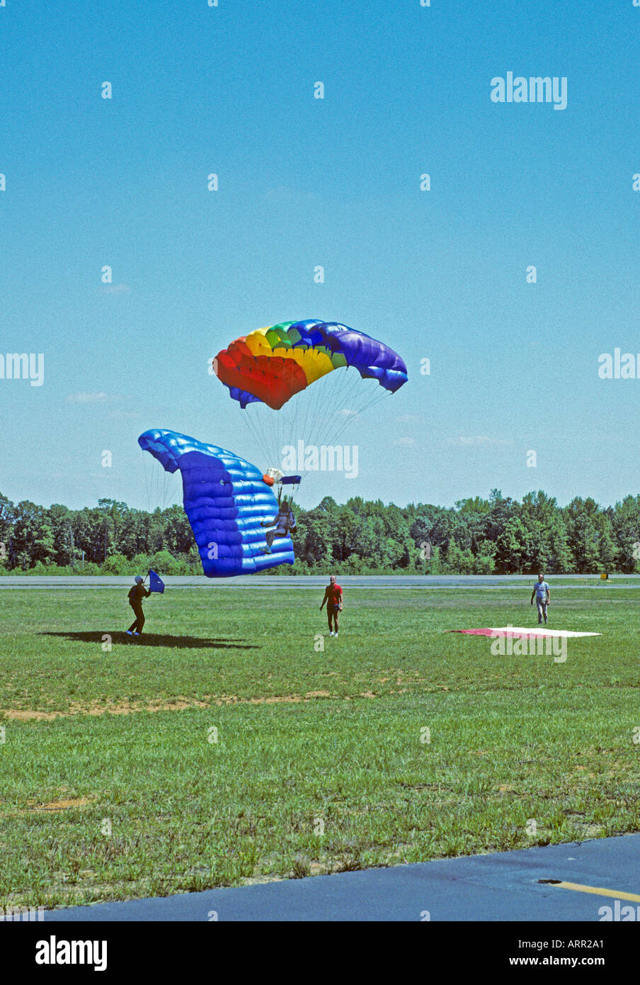 Colorful parachutes landing near target Stock Photo Alamy
