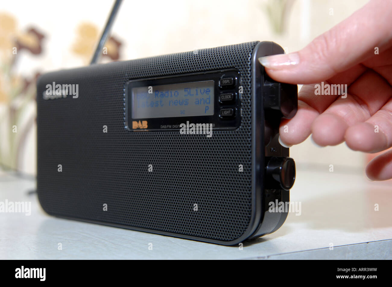 A small digital radio tuned in to BBC radio 5 live Over the next few years  television and radio will change to digital Stock Photo - Alamy
