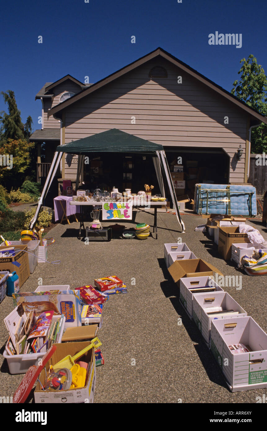 Residential neighborhood family is having a garage sale in their front