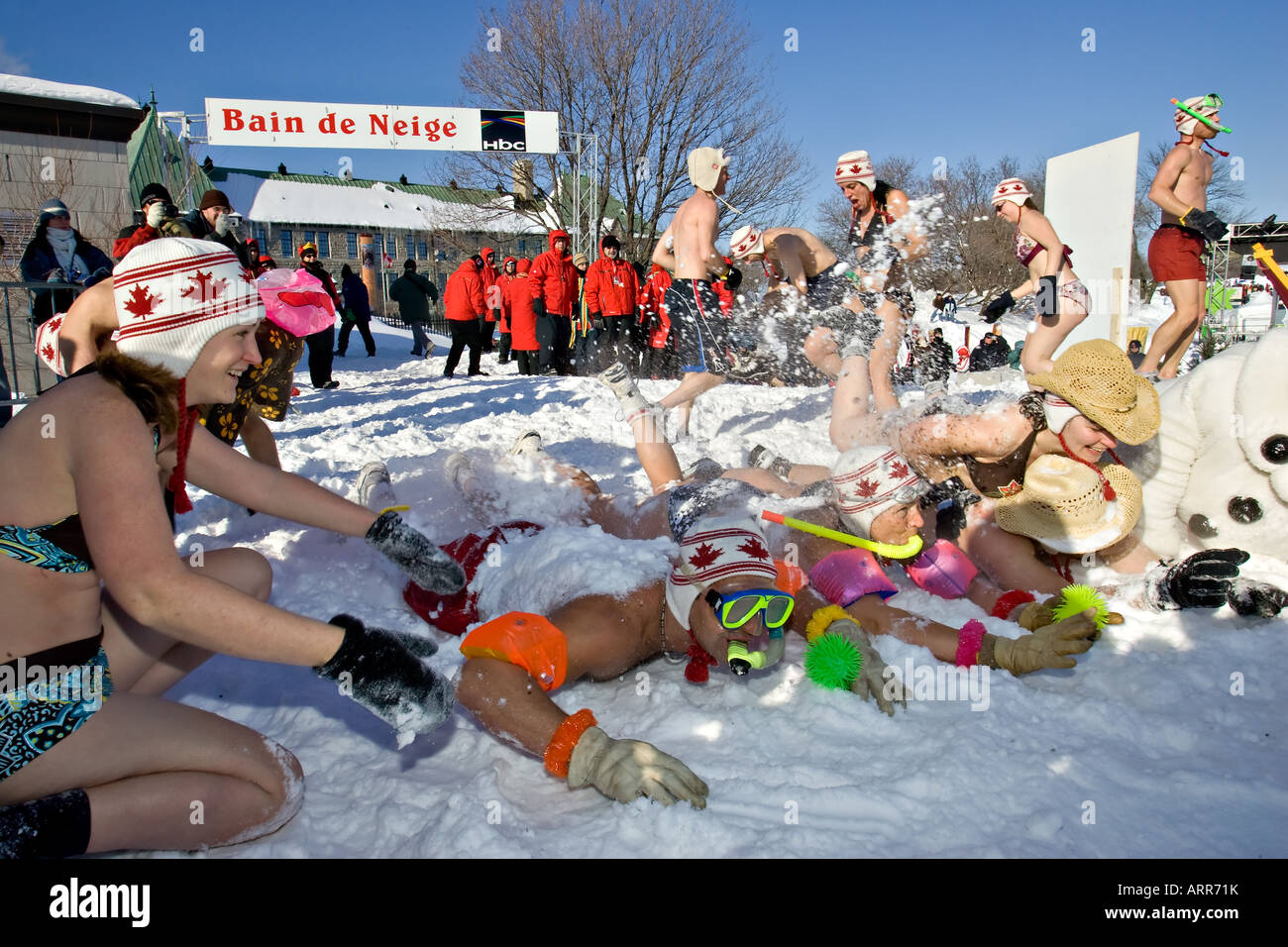 Carnival goers have fun during the annual Snow Bath an highlight of the Quebec Winter Carniva Stock Photo