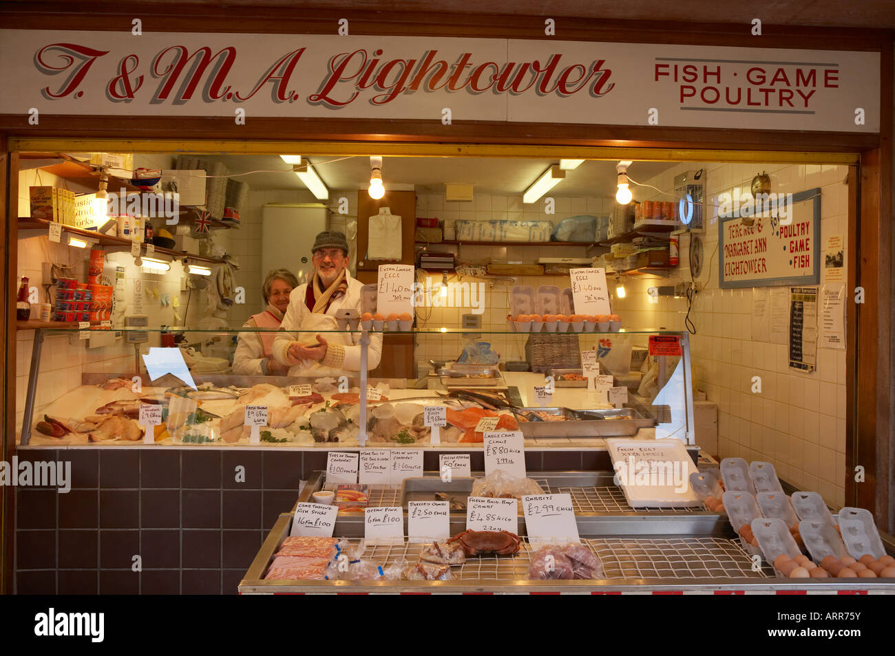 DEWSBURY TOWN CENTRE MARKET STALL SELLING FRESH FISH POULTRY AND GAME