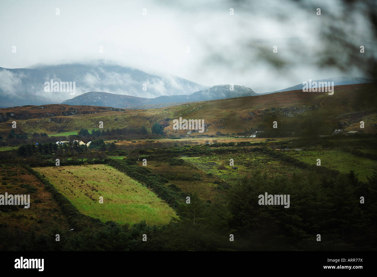 Hill with Distant Fog Covered Mountain Inishowen Peninsula, County Donegal, Republic of Ireland, Europe Stock Photo