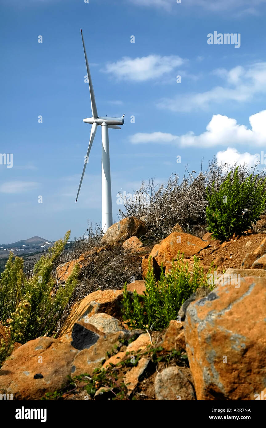 Wind Turbine Against Clear Blue Sky and Sun Stock Photo - Alamy