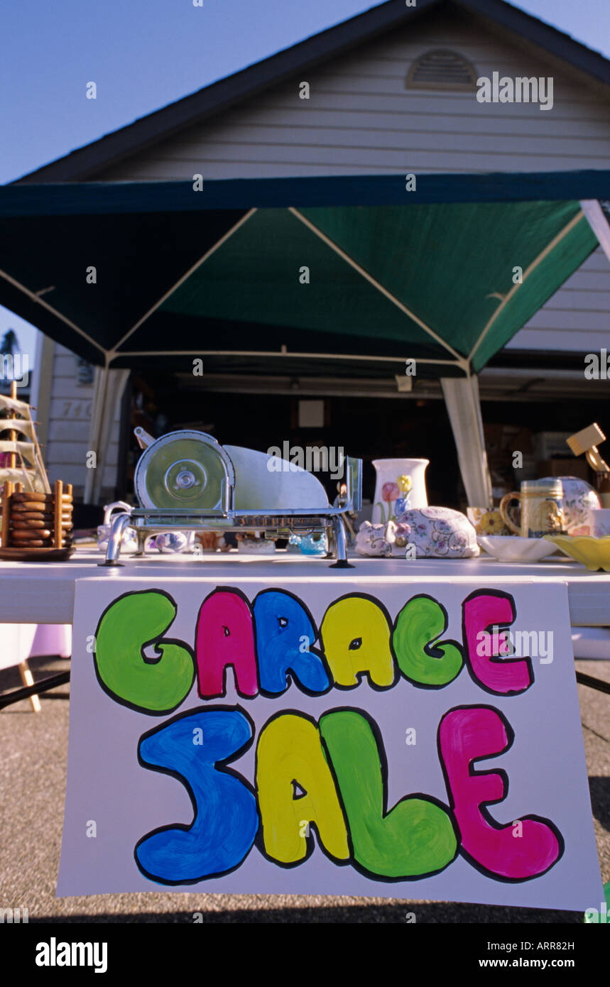 Residential neighborhood family is having a garage sale in their front