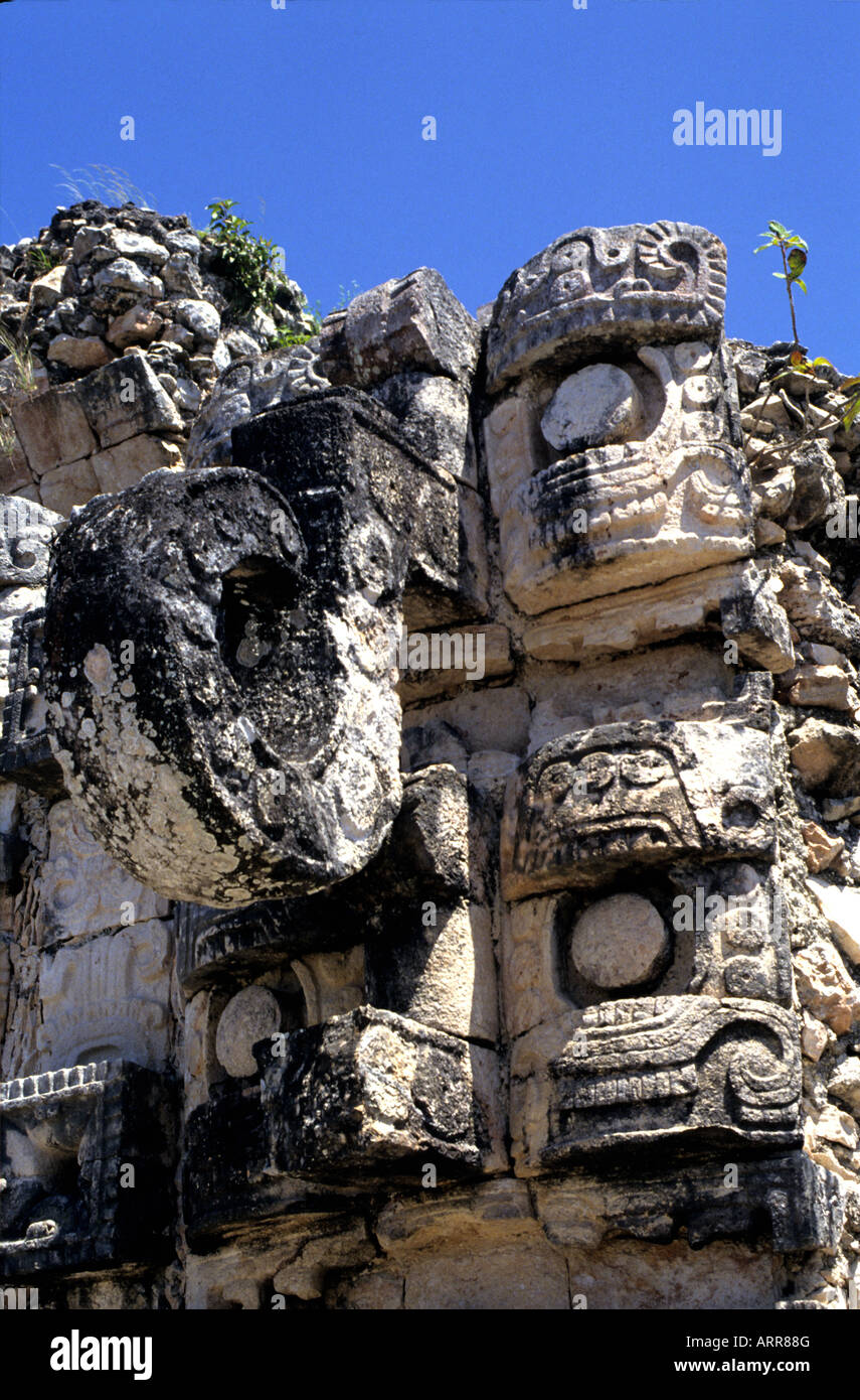 Detailed carving of Gods on Mayan ruins in Mexico head of Quetzalcoatl ...
