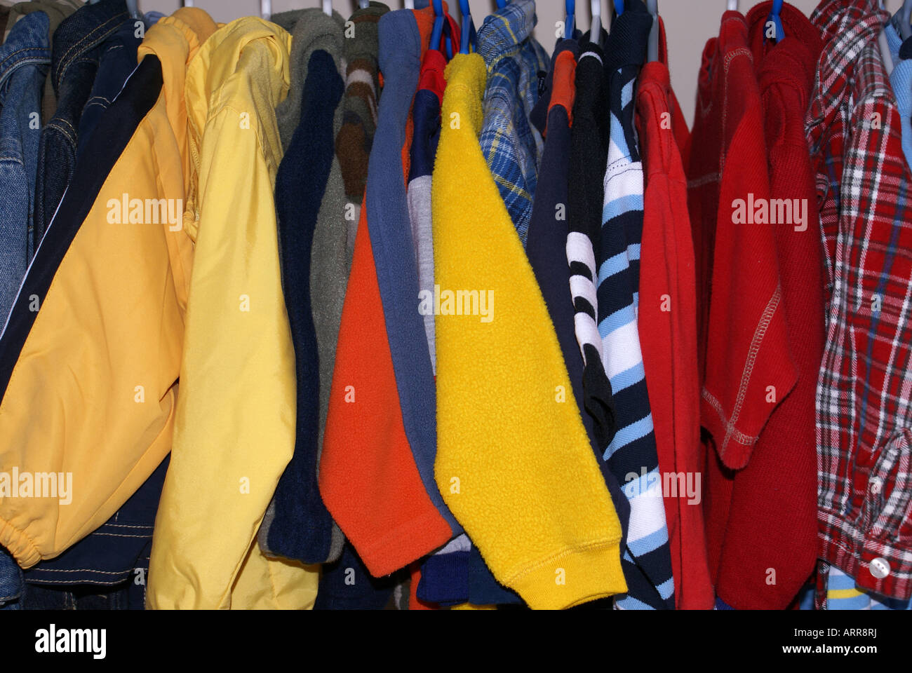 clothes [hanging in closet] Stock Photo