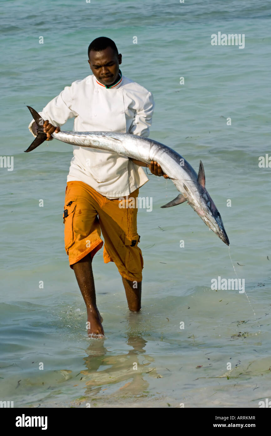 Man Carrying Tuna Fish Stock Photo - Alamy