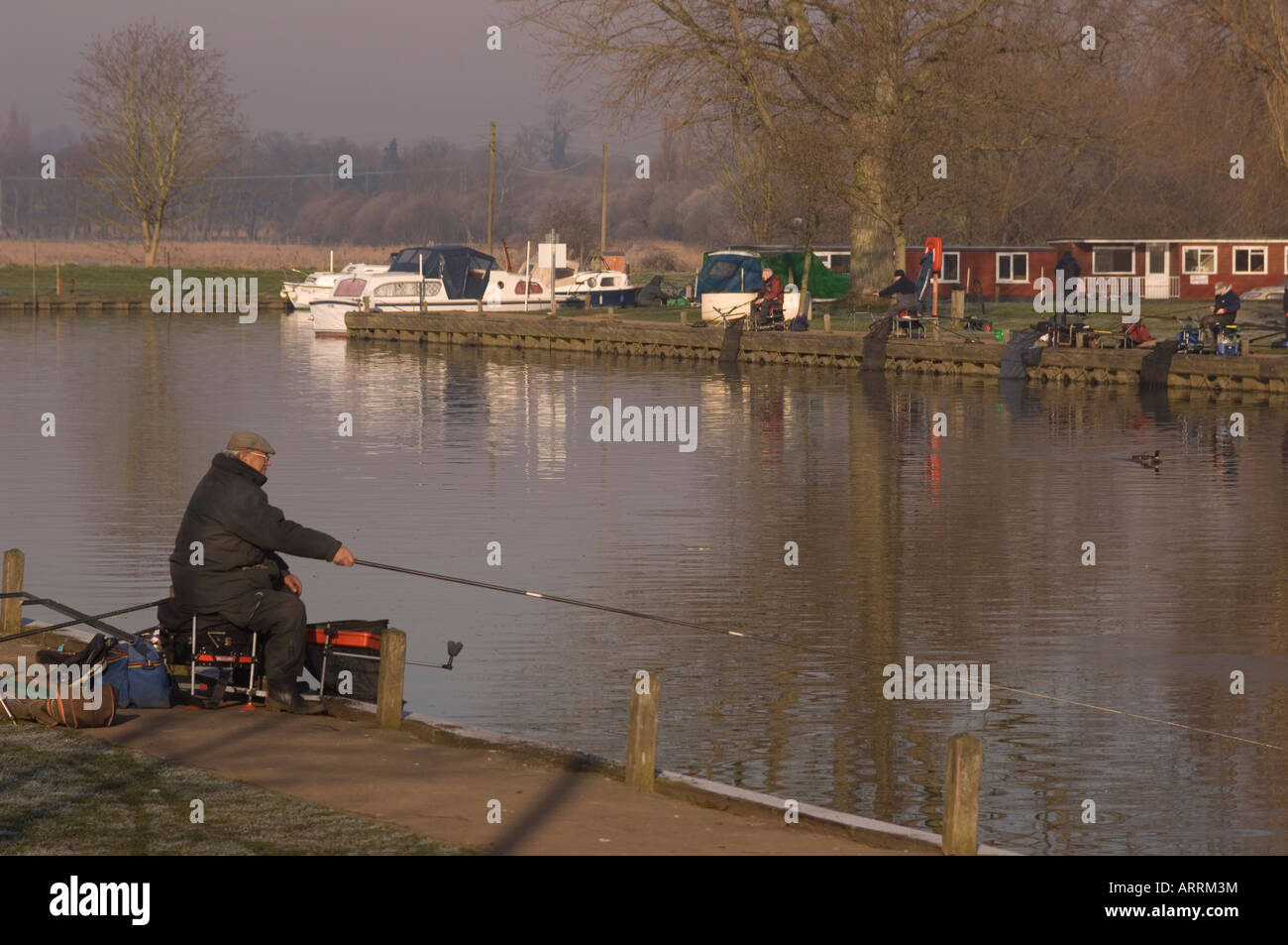 Fishing Match At Beccles Quay In Winter in the uk Stock Photo Alamy